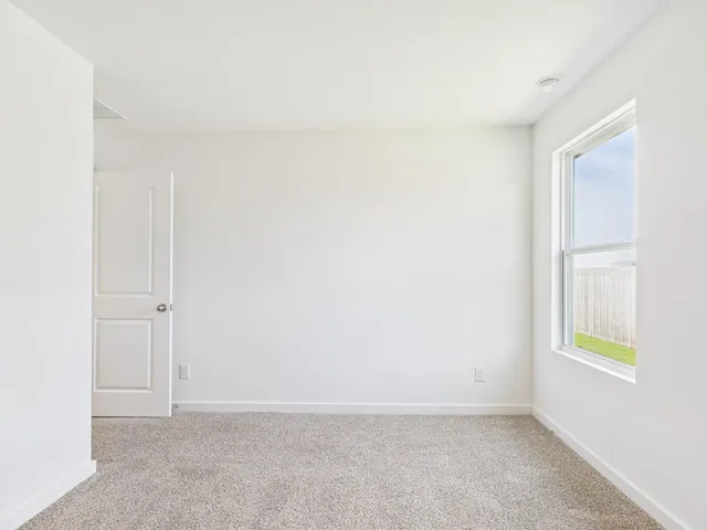 a bathroom with a granite countertop sink a toilet and bathtub