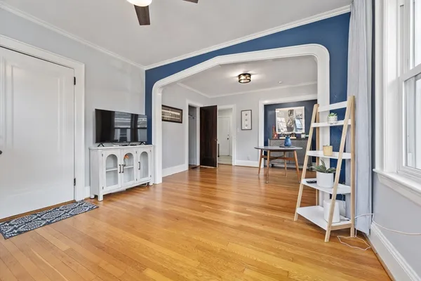 a room with furniture and a flat screen tv