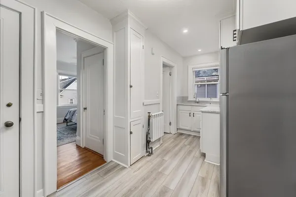 a bathroom with a sink and mirror