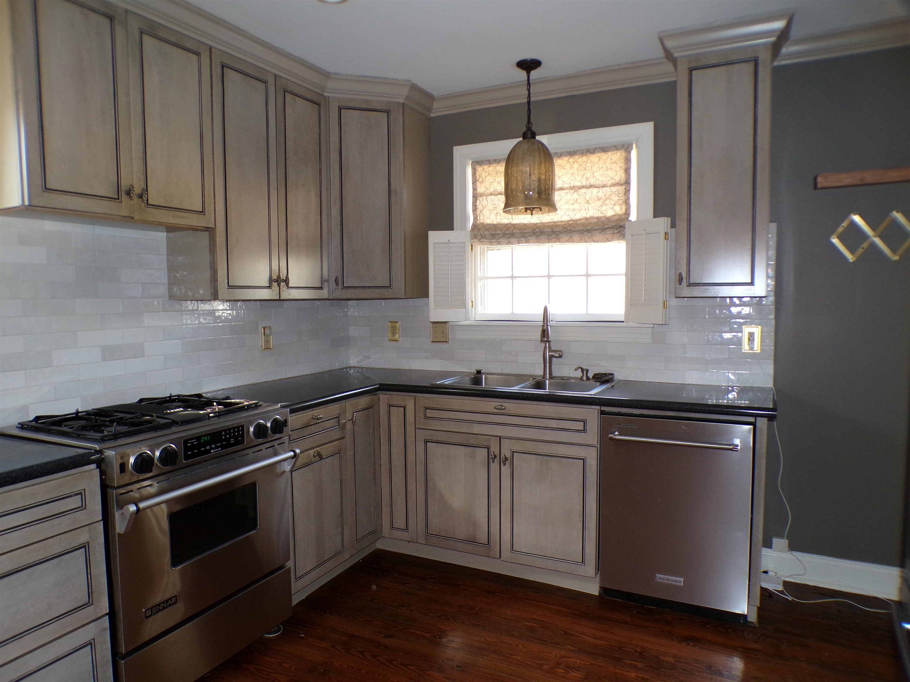 527 South Goodlett Street Memphis, TN 38117 - Photo 13 of 34 Pretty Cabinetry with soft-pull drawers and granite counters; Jenn-Air Gas Range with convection oven;