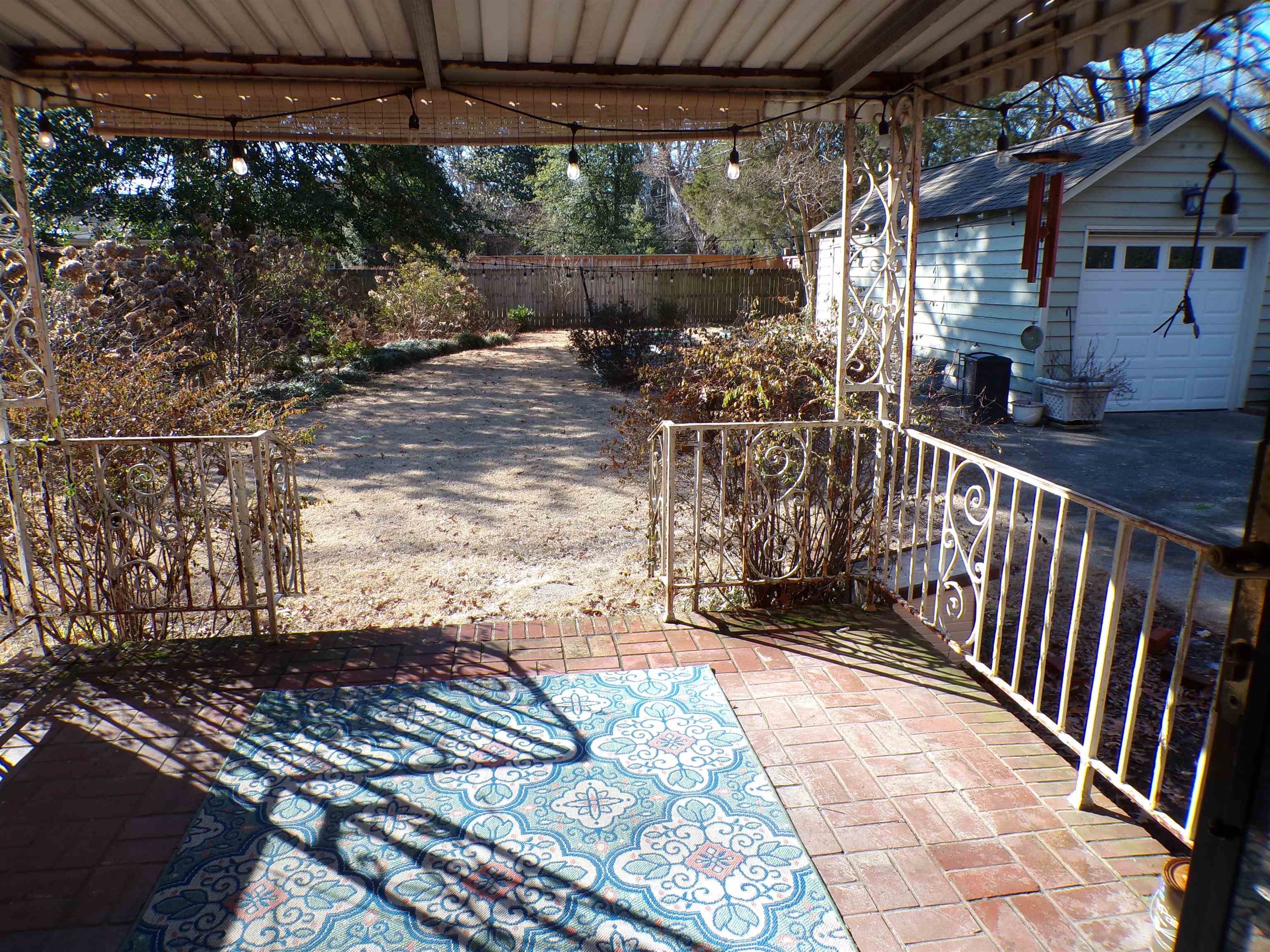 527 South Goodlett Street Memphis, TN 38117 - Photo 29 of 34 Overlooks backyard; The white Hydrangeas in the summer are gorgeous, over 6 ft, and the snowball viburnum in the spring is amazing!