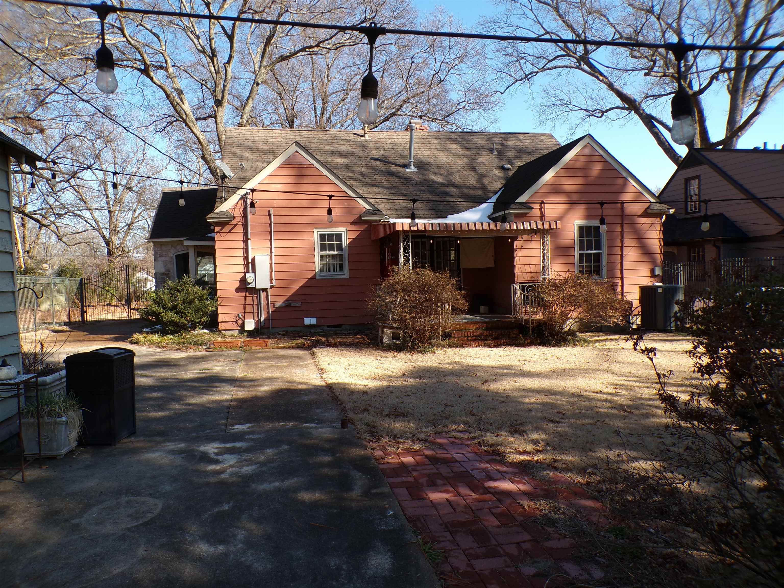 527 South Goodlett Street Memphis, TN 38117 - Photo 34 of 34 String lights and summer nights will be wonderful in this backyard!