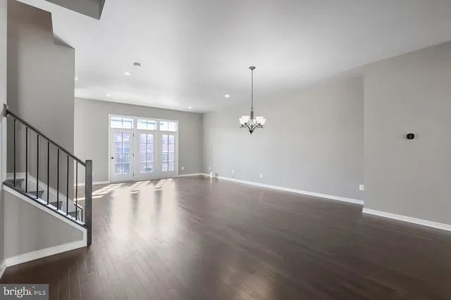 a view of a kitchen with a sink and a window