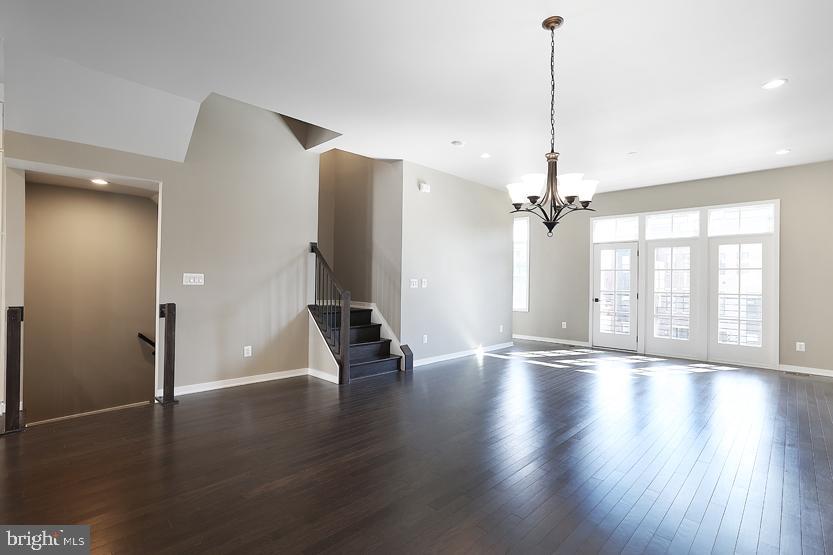 22170 Penelope Heights Terrace Ashburn, VA 20148 - Photo 18 of 61 a view of empty room with wooden floor and fan