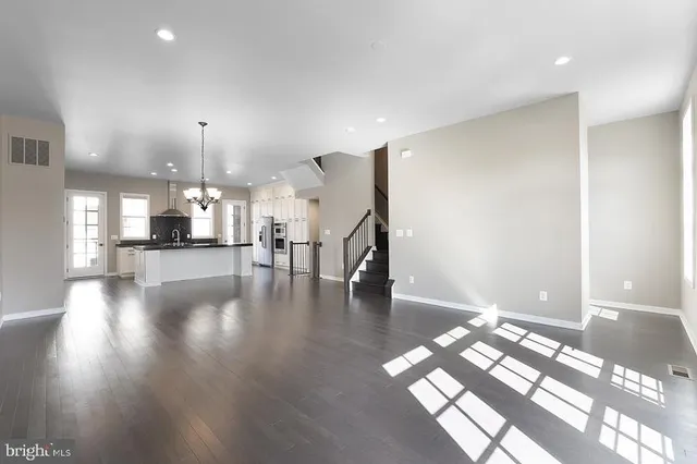 a bathroom with a sink toilet and mirror