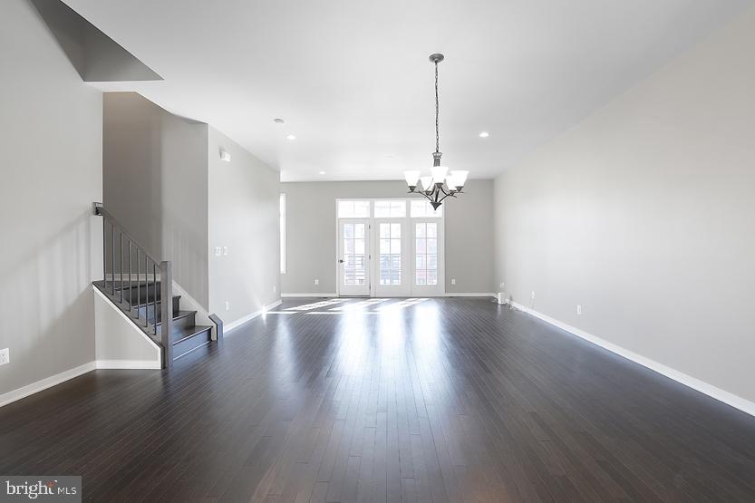 22170 Penelope Heights Terrace Ashburn, VA 20148 - Photo 22 of 61 a view of empty room with wooden floor and window