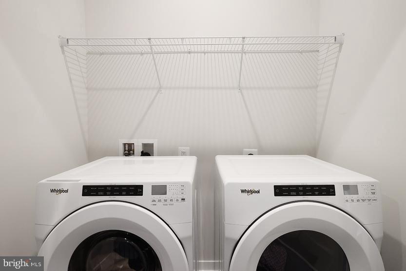 22170 Penelope Heights Terrace Ashburn, VA 20148 - Photo 34 of 61 a utility room with dryer and washer
