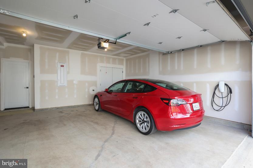 22170 Penelope Heights Terrace Ashburn, VA 20148 - Photo 47 of 61 a car is parked in a room