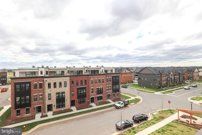 22170 Penelope Heights Terrace Ashburn, VA 20148 - Photo 48 of 61 a view of a city with tall buildings