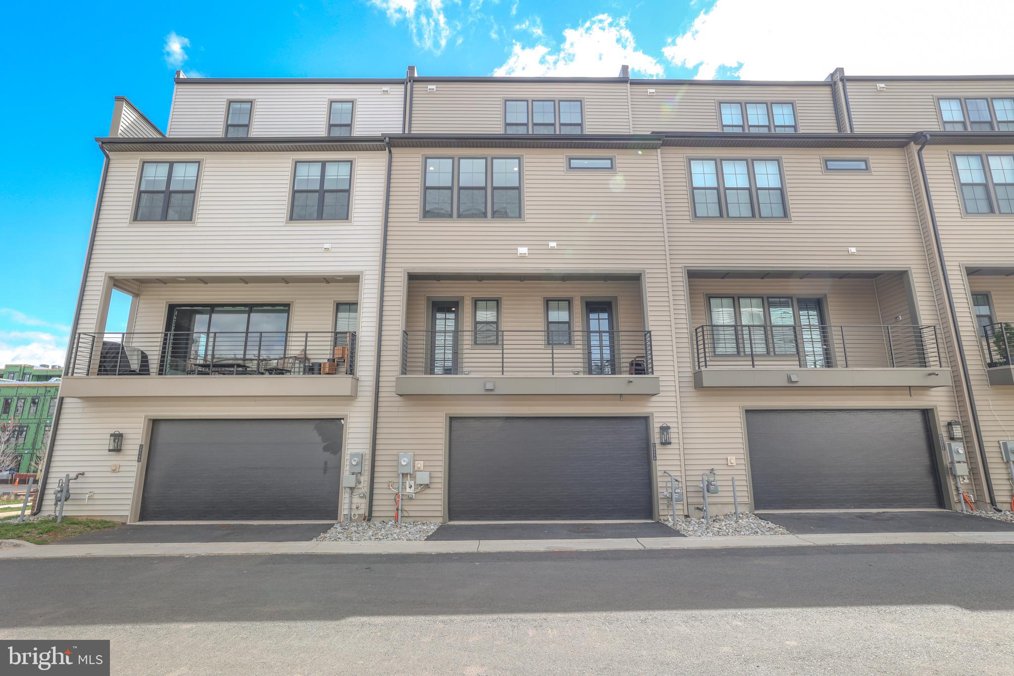 22170 Penelope Heights Terrace Ashburn, VA 20148 - Photo 49 of 61 a front view of residential houses