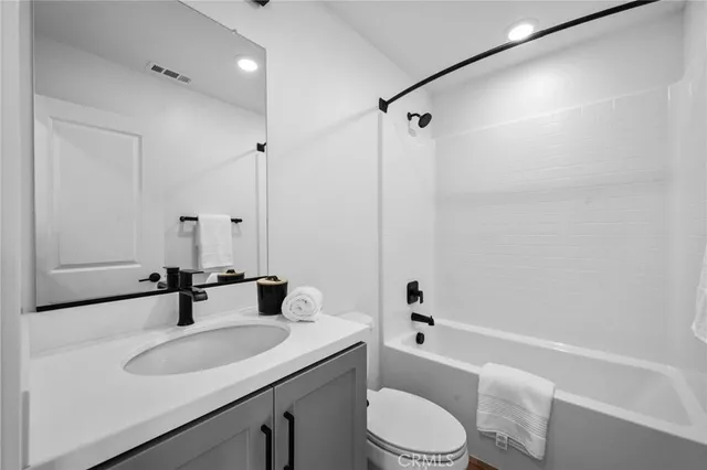 a workspace with furniture and a window