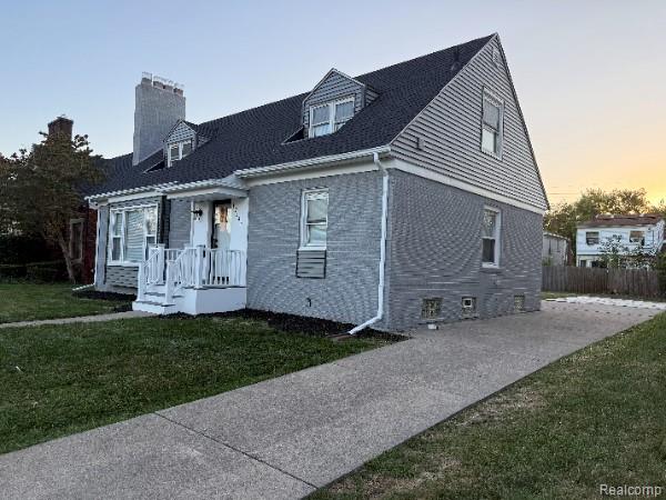 17345 Annchester Road Detroit, MI 48219 - Photo 2 of 22 View of front of home featuring a chimney and brick siding