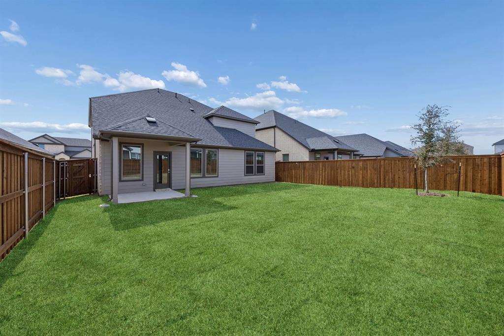 1432 Companero Street Haslet, TX 76052 - Photo 33 of 36 Covered Patio in the Masters home plan by Trophy Signature Homes – REPRESENTATIVE PHOTO