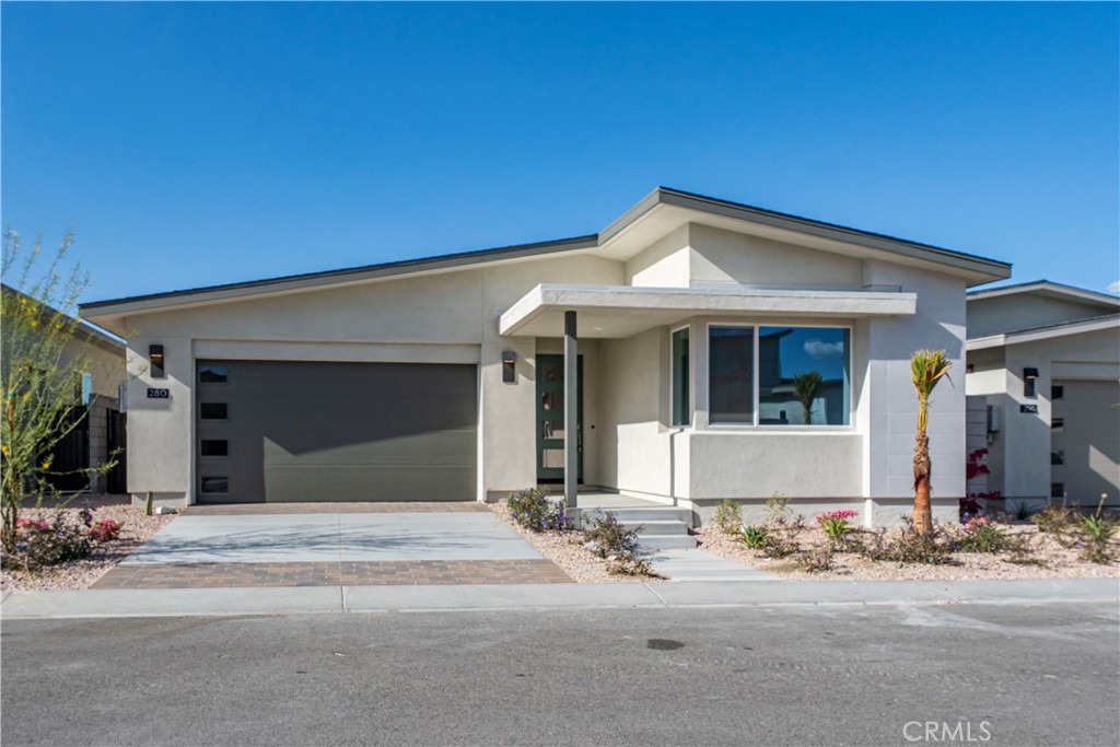 280 Mustang Lane Palm Springs, CA 92262 - Photo 1 of 12 a view of a house with a patio