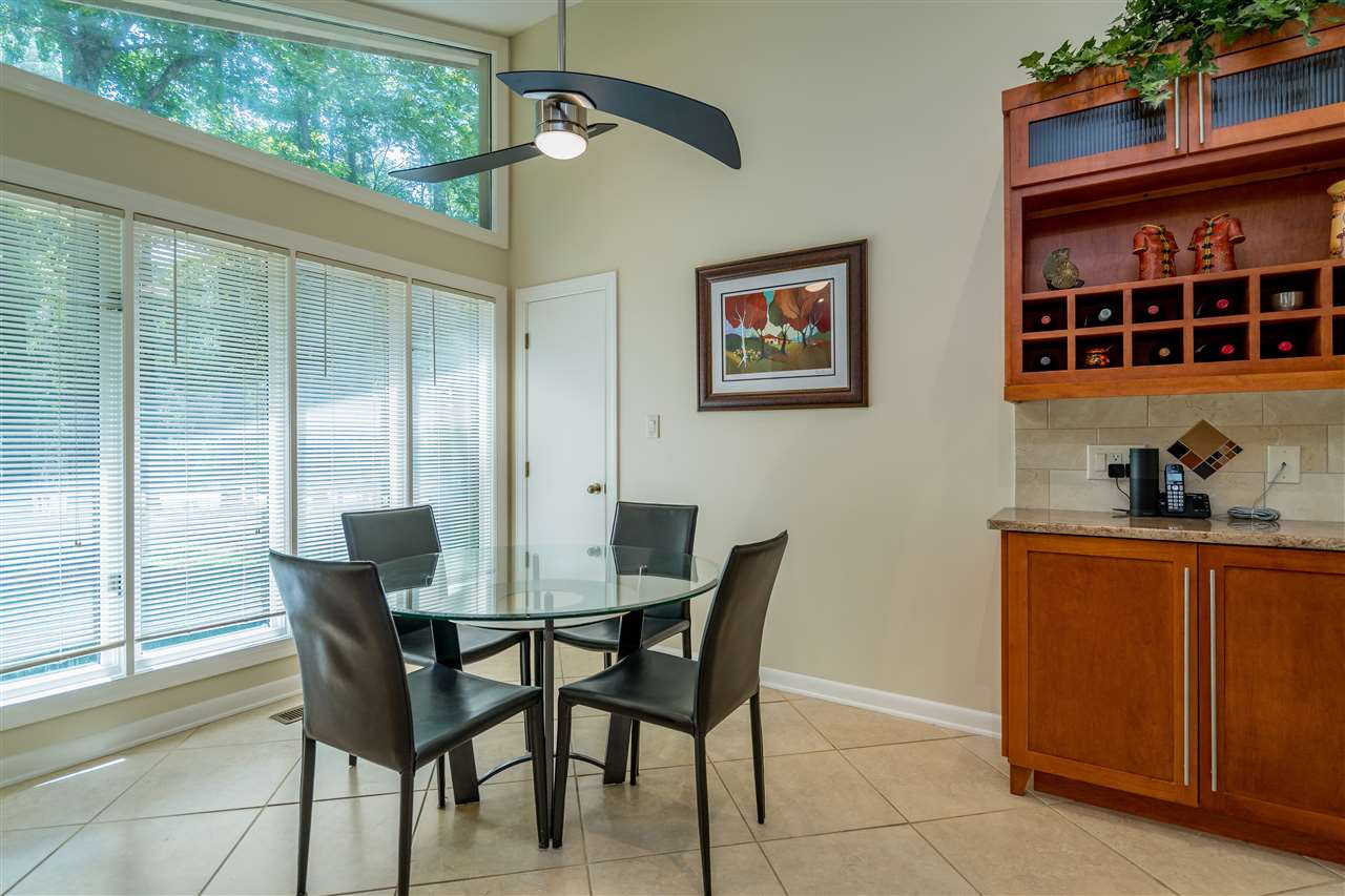 2108 Countrywood Road North Raleigh, NC 27615 - Photo 14 of 30 Lots of light comes in through the wall of windows making this a great place for a casual meal. Casual Dining