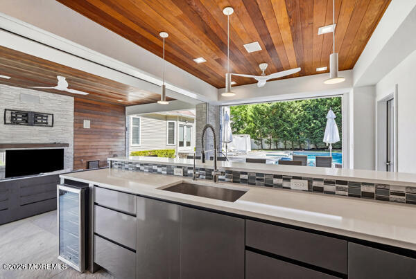 54 Georgetown Road Eatontown, NJ 07724 - Photo 19 of 24 a kitchen with a sink and a large window