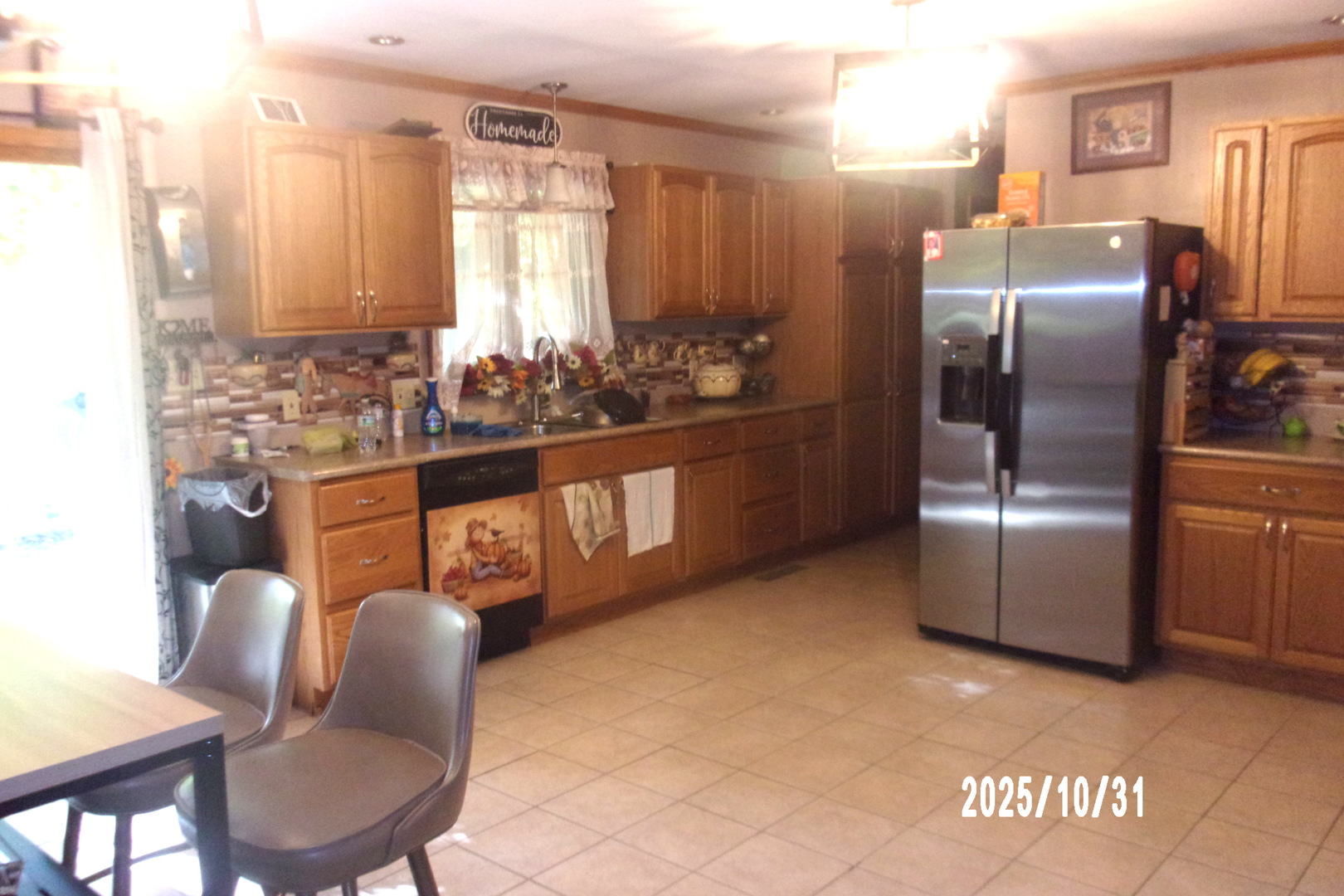 407 East Pine Street Chatsworth, IL 60921 - Photo 9 of 27 a kitchen with stainless steel appliances granite countertop a refrigerator and a stove