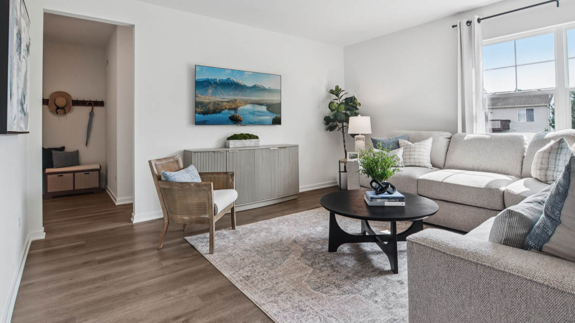 1871 Keating Drive Aurora, IL 60503 - Photo 12 of 27 a living room with furniture and a potted plant on table