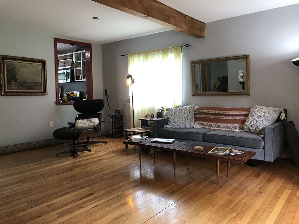 75 Spaulding Street, Unit 75 Amherst, MA 01002 - Photo 11 of 36 a living room with furniture pool table and a window