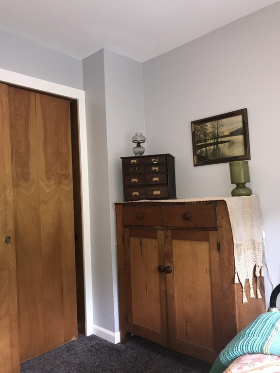 75 Spaulding Street, Unit 75 Amherst, MA 01002 - Photo 25 of 36 a view of workspace with mirror