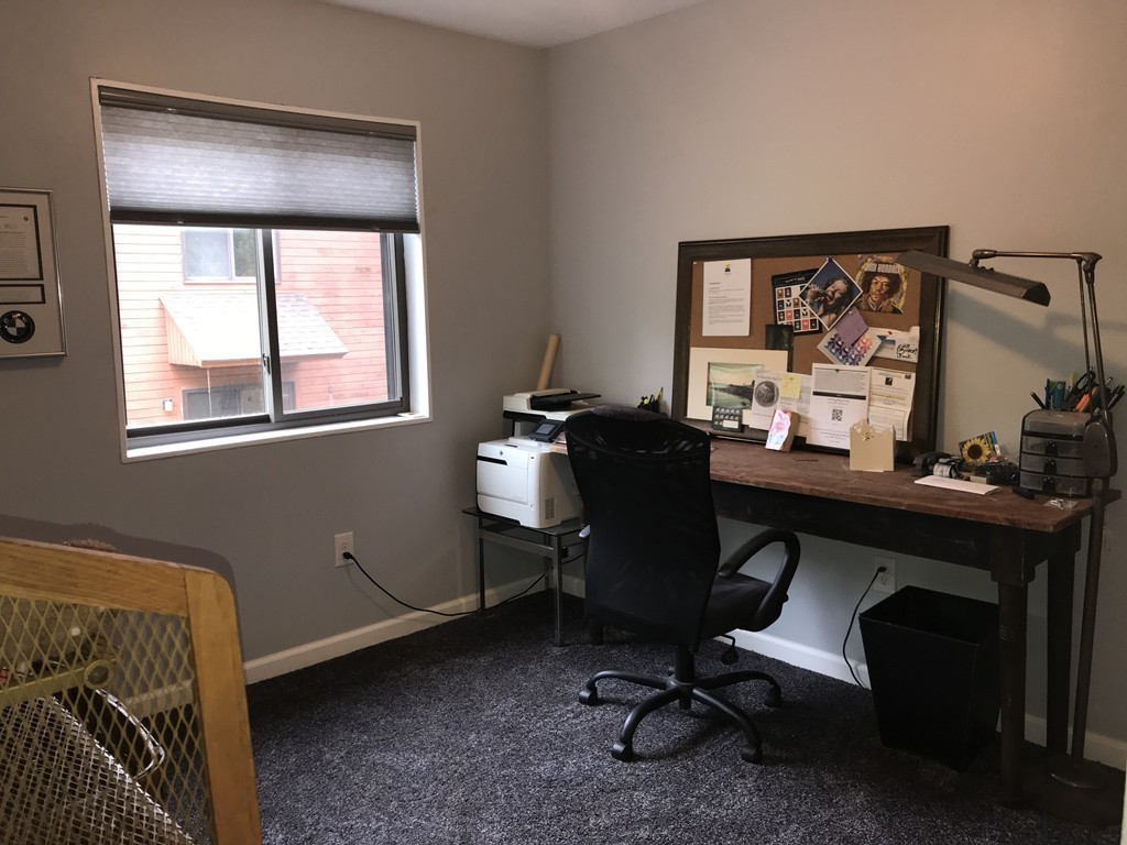 75 Spaulding Street, Unit 75 Amherst, MA 01002 - Photo 27 of 36 a view of a workspace with furniture and a window