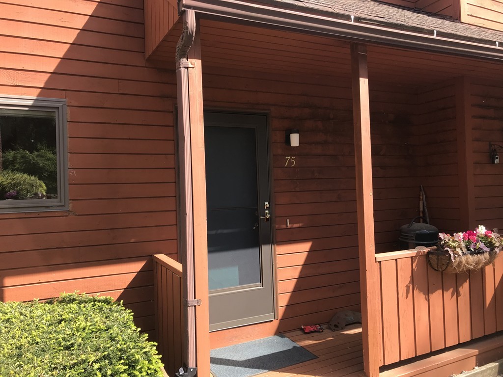 75 Spaulding Street, Unit 75 Amherst, MA 01002 - Photo 3 of 36 a view of backyard from door