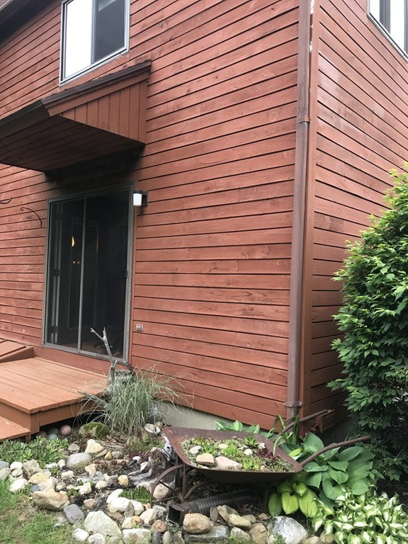 75 Spaulding Street, Unit 75 Amherst, MA 01002 - Photo 32 of 36 a view of a backyard of the house