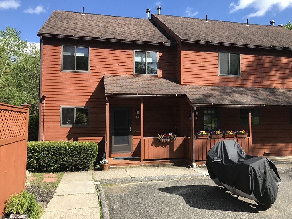 75 Spaulding Street, Unit 75 Amherst, MA 01002 - Photo 34 of 36 a backyard of a house with seating space