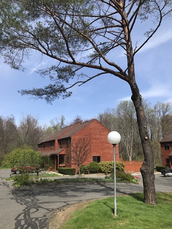 75 Spaulding Street, Unit 75 Amherst, MA 01002 - Photo 36 of 36 a front view of a house with a yard