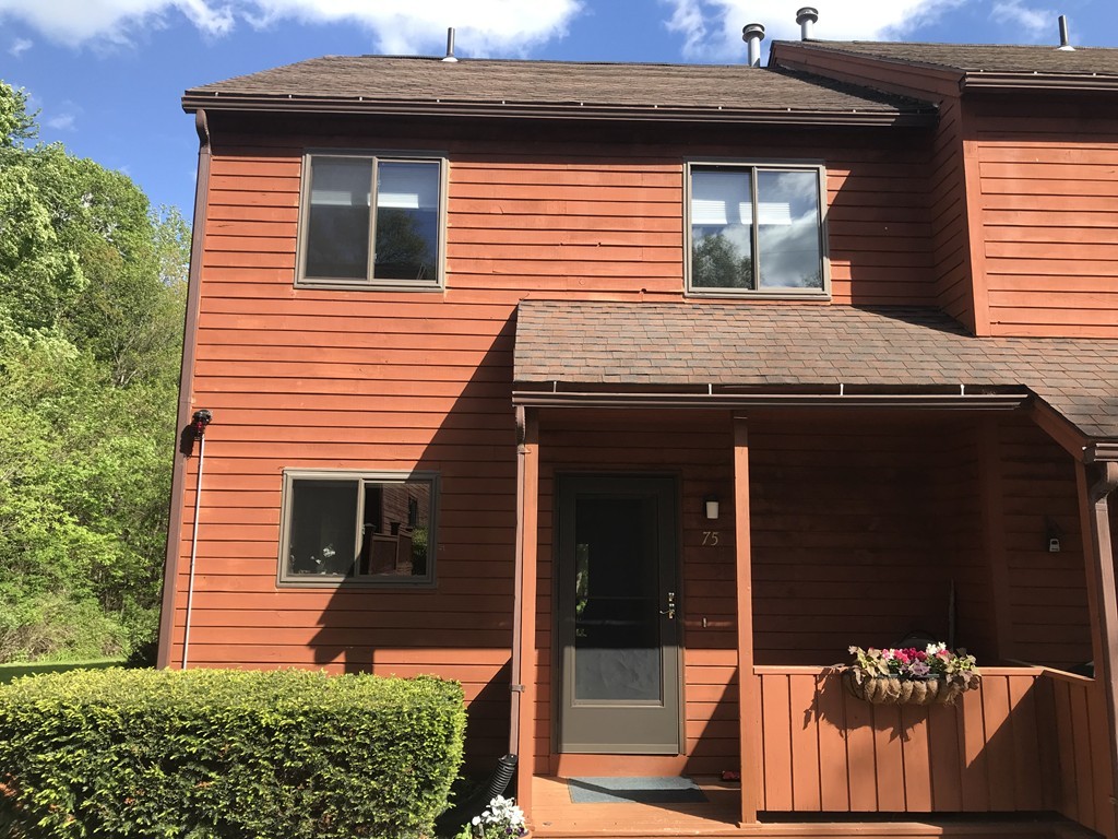 75 Spaulding Street, Unit 75 Amherst, MA 01002 - Photo 4 of 36 a front view of a house with a porch