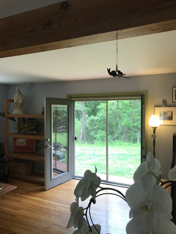 75 Spaulding Street, Unit 75 Amherst, MA 01002 - Photo 9 of 36 a room with furniture and a window