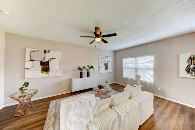a bed room with a bed and a chandelier