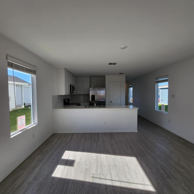 543 Commander Abbott Drive Jarrell, TX 76537 - Photo 5 of 12 a view of kitchen with furniture and window