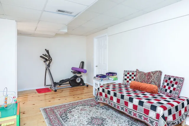 a bedroom with furniture and a couch