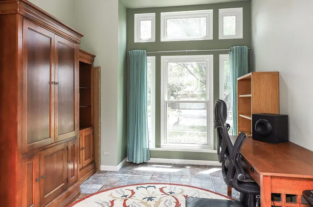 a view of a livingroom with a window and storage