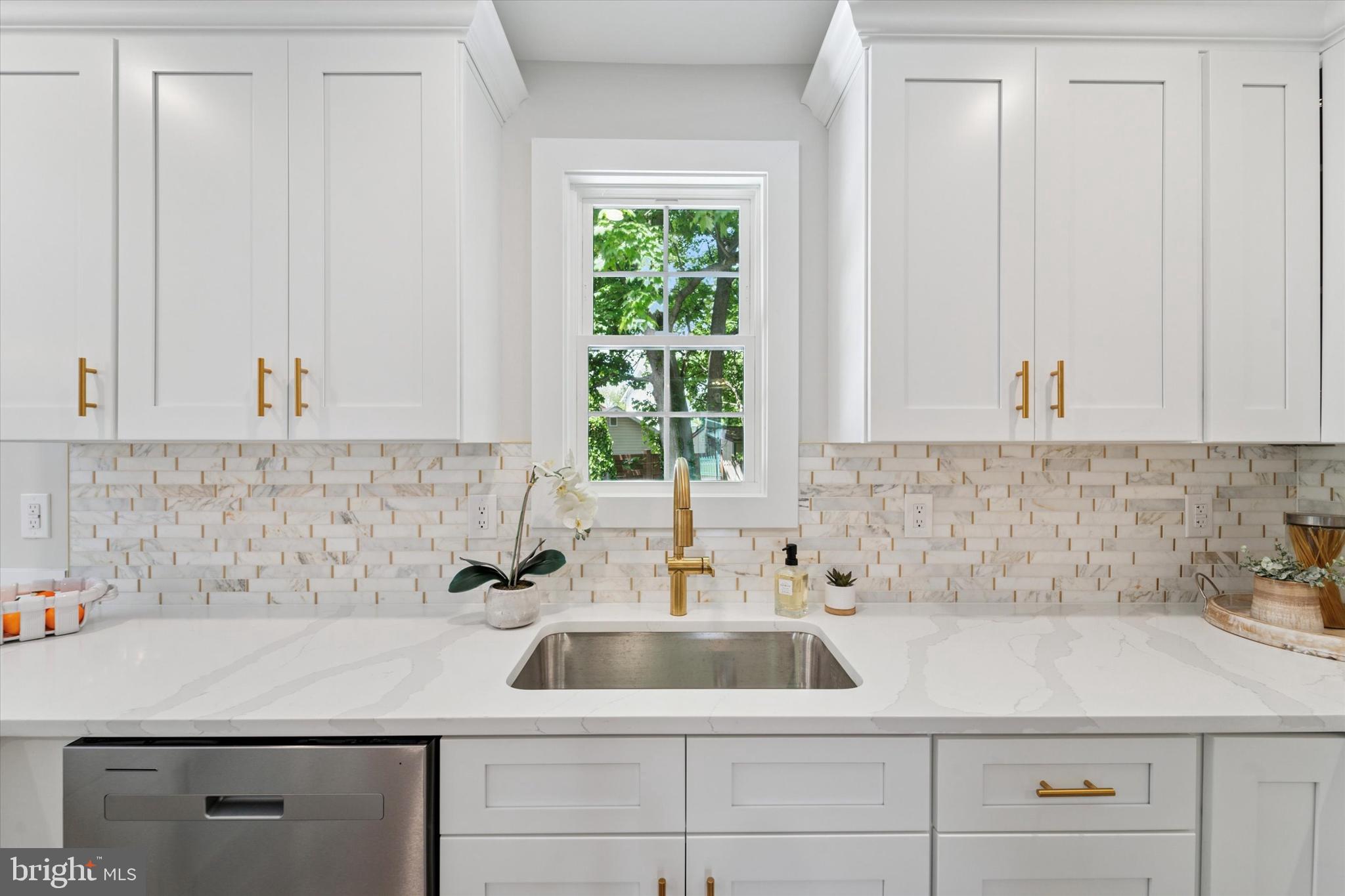 130 Walnut Avenue Pitman, NJ 08071 - Photo 11 of 35 a bathroom with a sink and a white cabinet