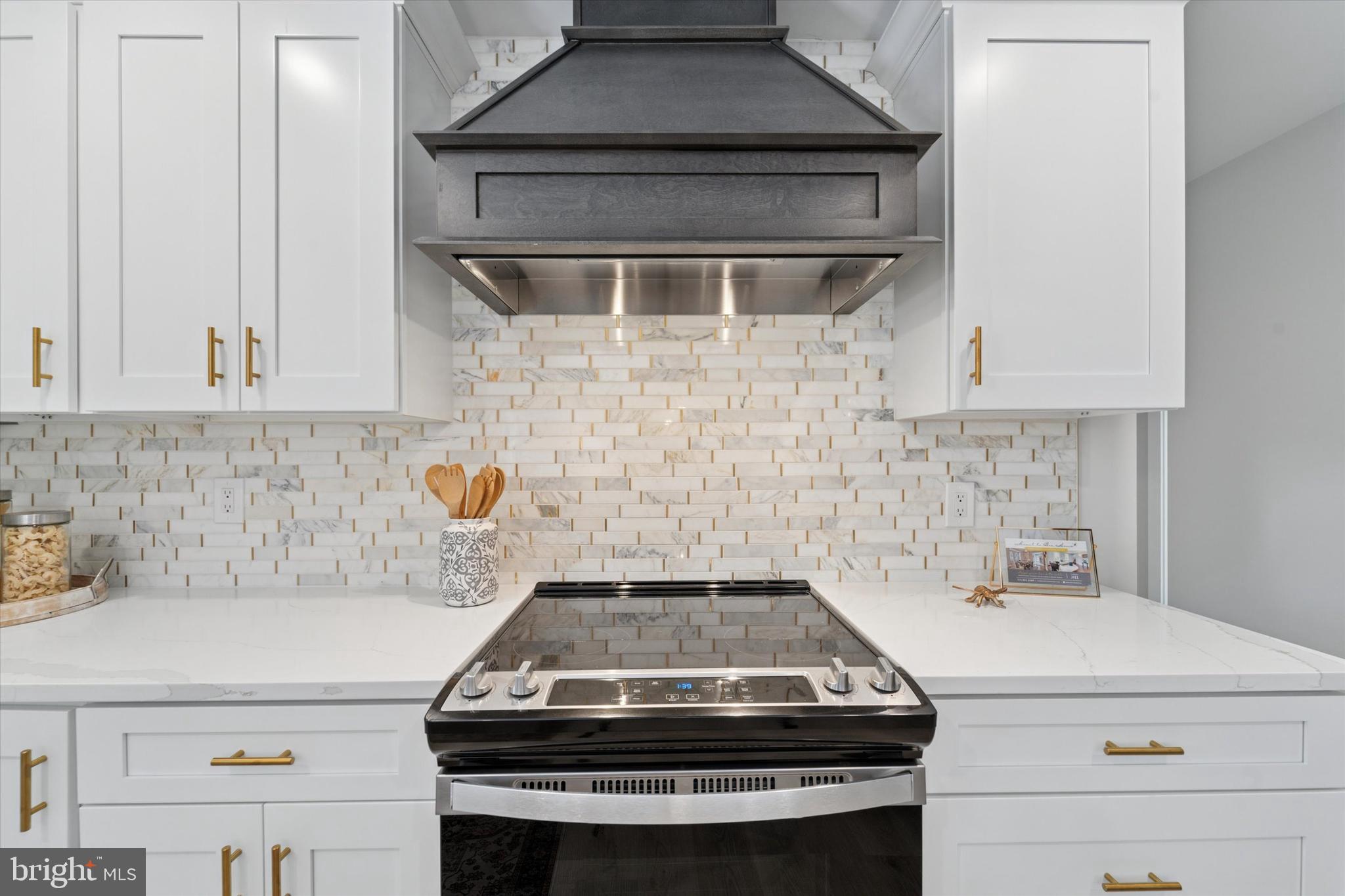 130 Walnut Avenue Pitman, NJ 08071 - Photo 12 of 35 a stove top oven sitting inside of a kitchen