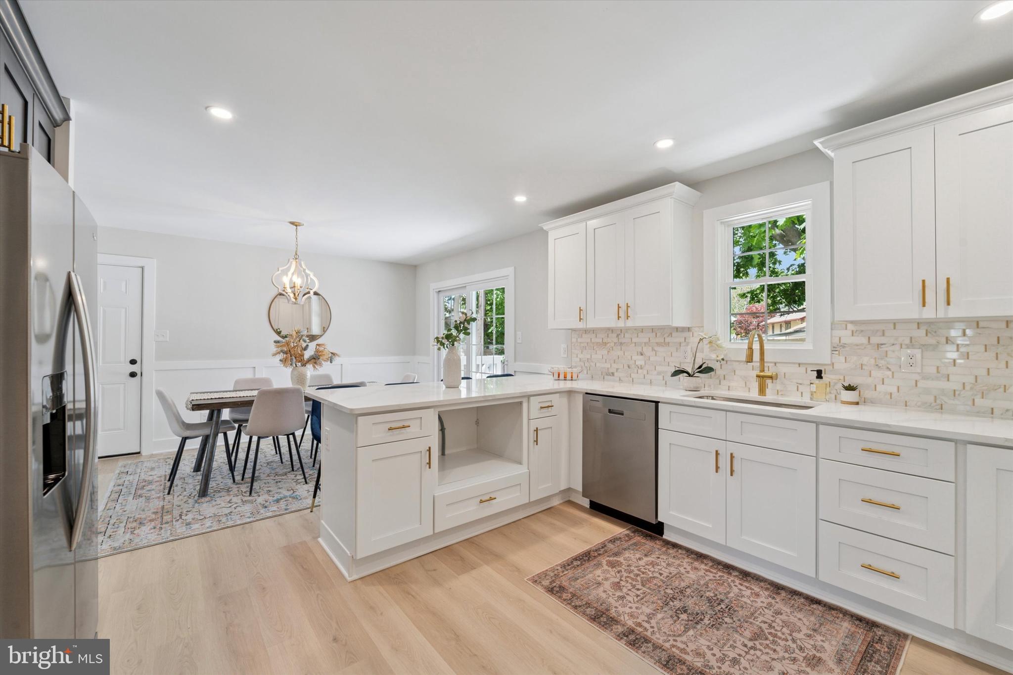 130 Walnut Avenue Pitman, NJ 08071 - Photo 13 of 35 a kitchen with white cabinets and sink