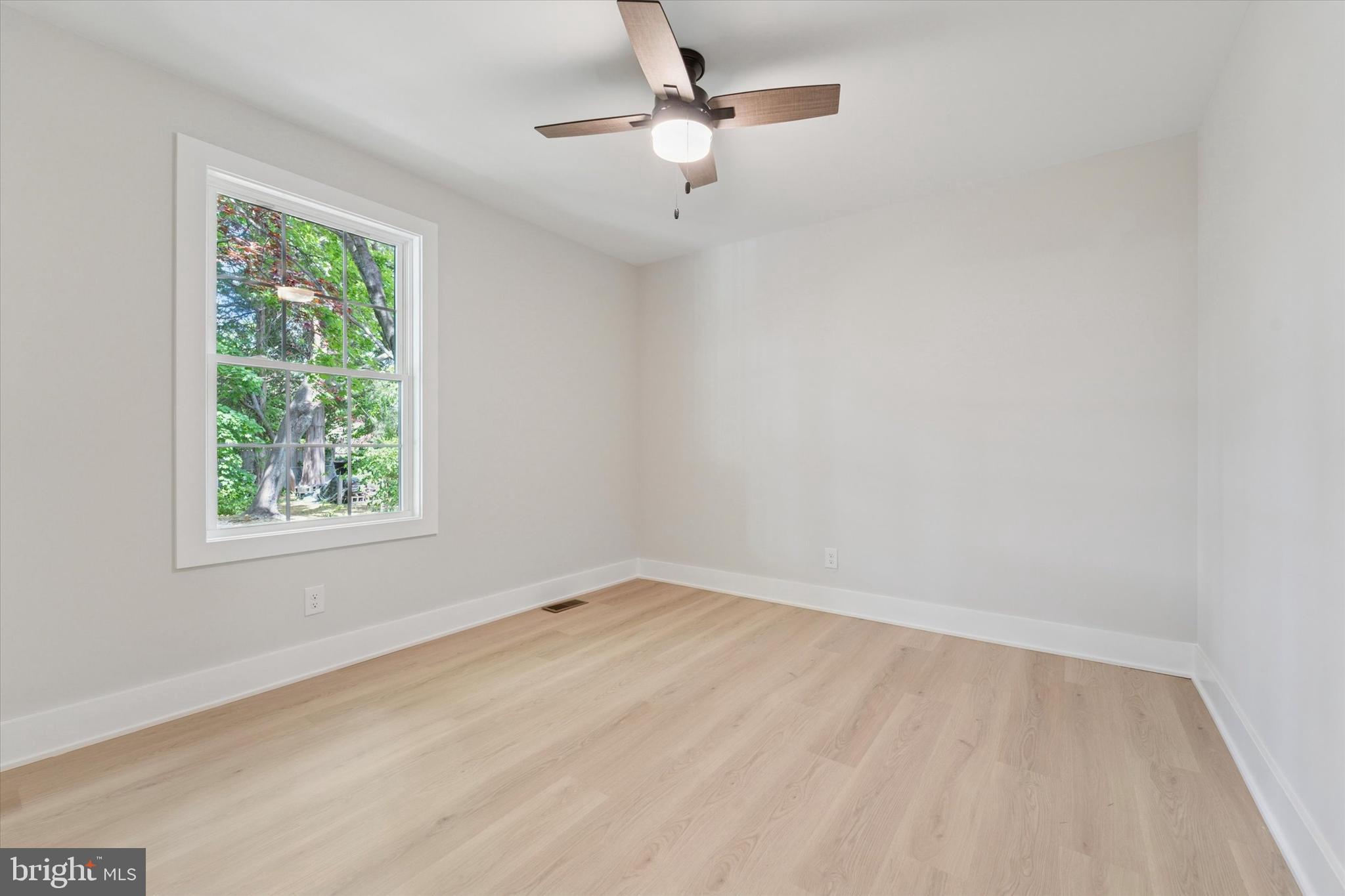 130 Walnut Avenue Pitman, NJ 08071 - Photo 15 of 35 wooden floor in an empty room with a window