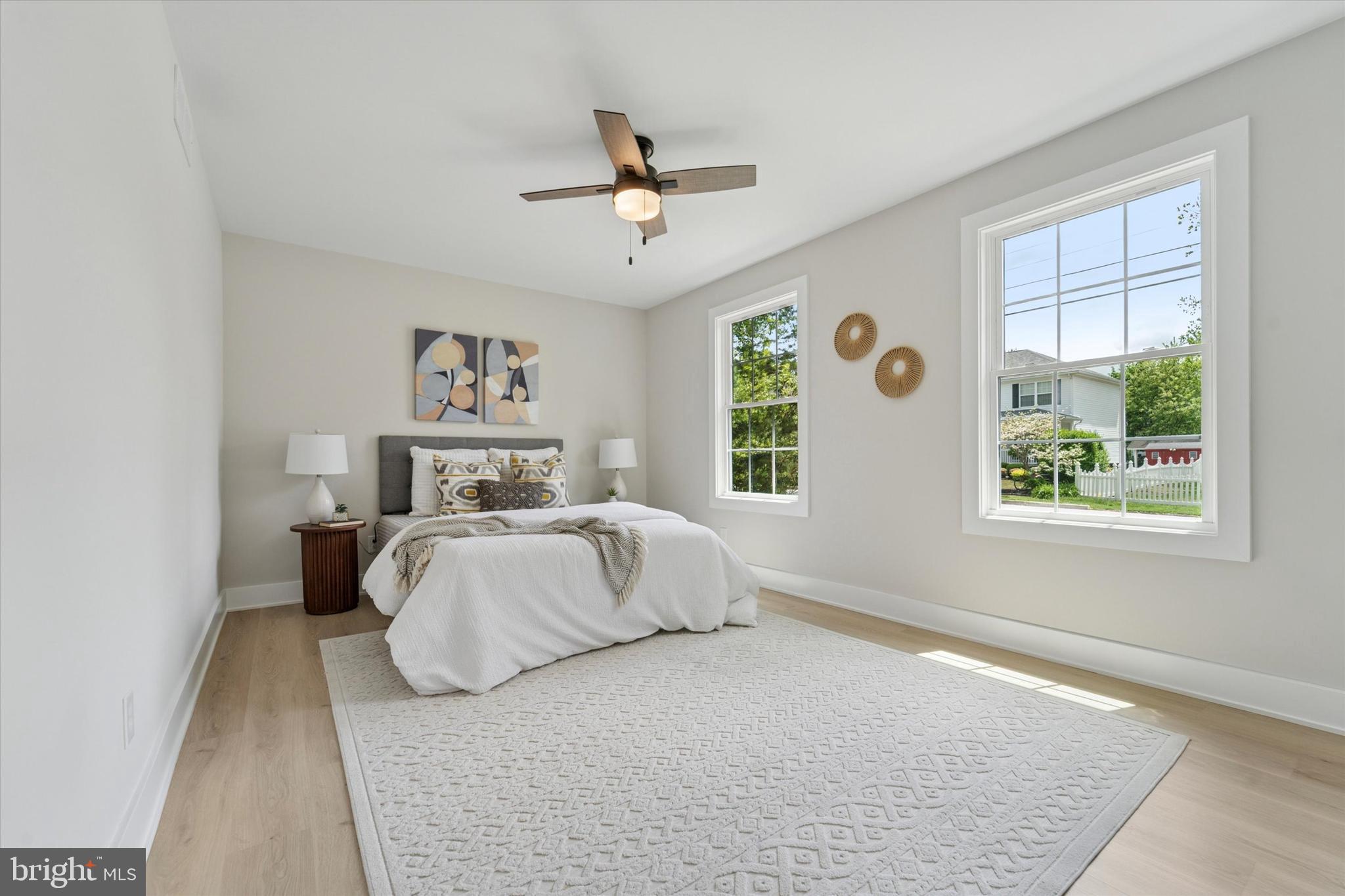130 Walnut Avenue Pitman, NJ 08071 - Photo 19 of 35 a bedroom with a large bed and a window