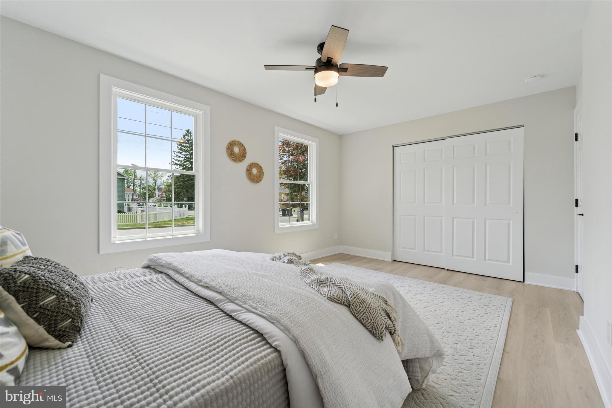 130 Walnut Avenue Pitman, NJ 08071 - Photo 21 of 35 a bedroom with a large bed and a window