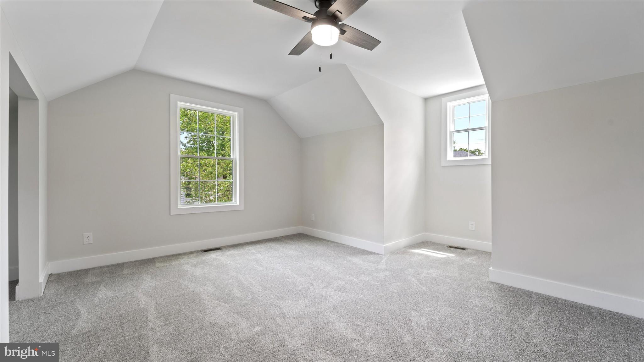 130 Walnut Avenue Pitman, NJ 08071 - Photo 26 of 35 an empty room with windows and fan