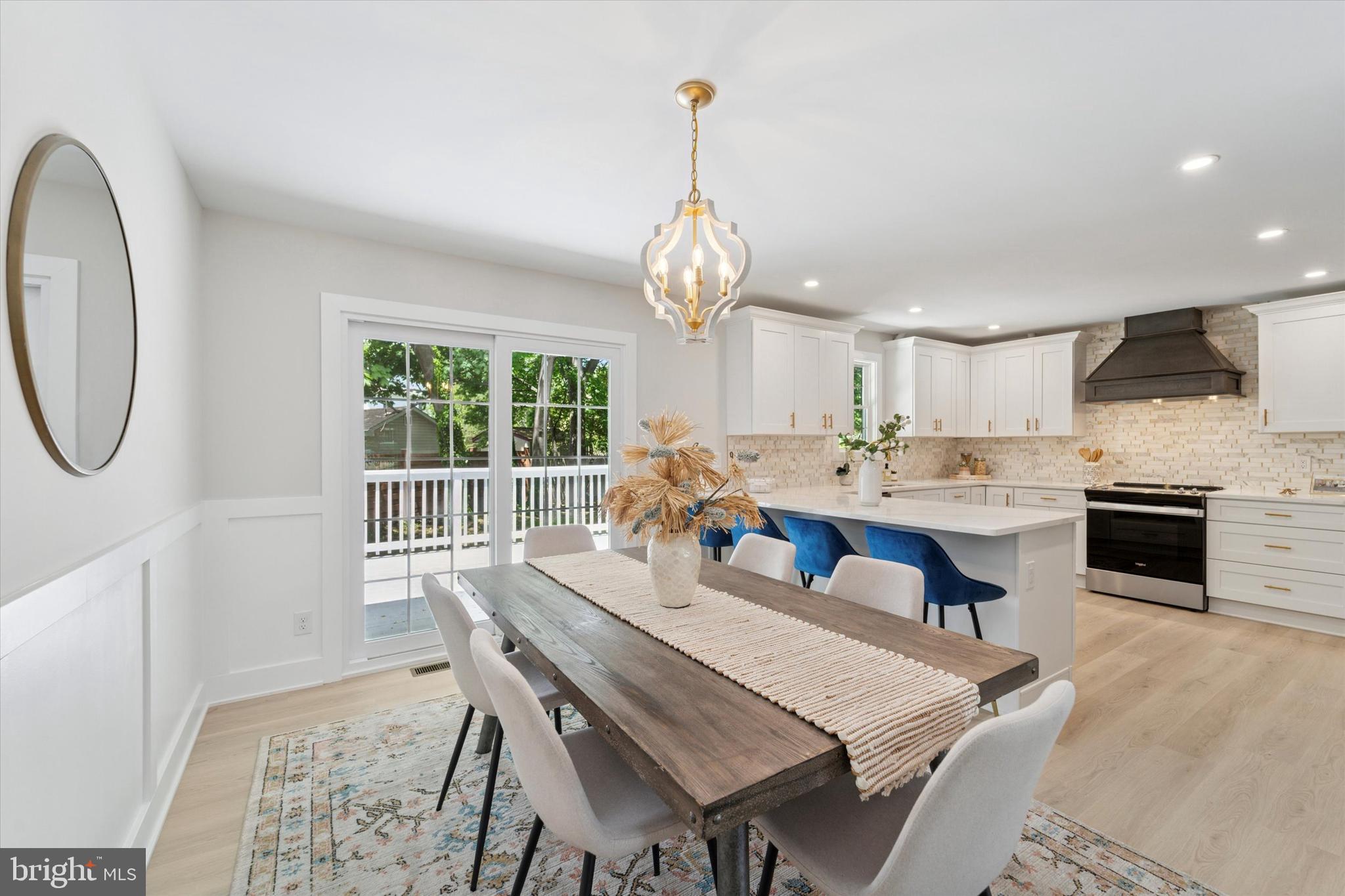 130 Walnut Avenue Pitman, NJ 08071 - Photo 8 of 35 a view of a dining room with furniture window and wooden floor