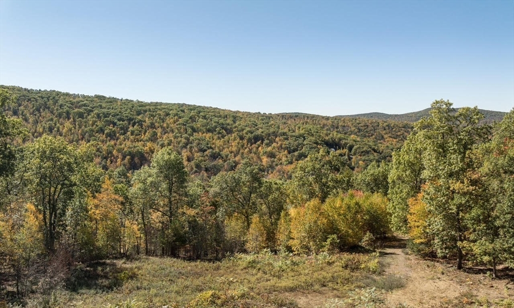 57 Bradway Road Monson, MA 01057 - Photo 4 of 8 a view of a large mountain with mountains in the background