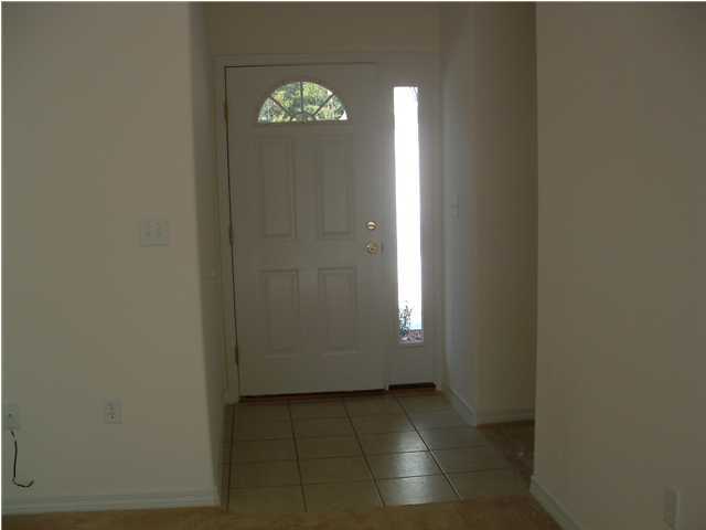 3911 High Ridge Road Crestview, FL 32539 - Photo 8 of 12 an empty room with windows