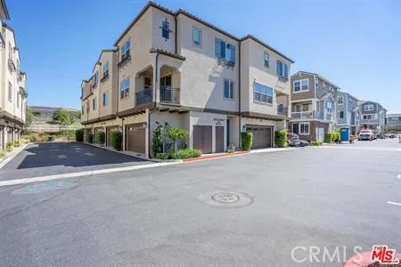 a view of a street with buildings