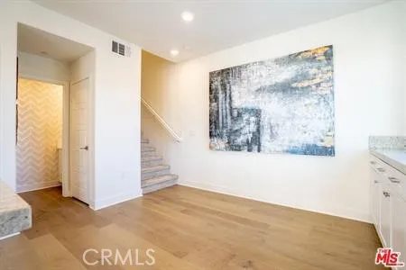 a view of a hallway with entryway