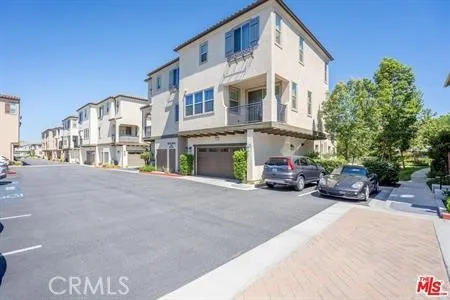 a view of a car parked in front of a building