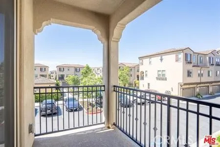 a view of a city from a balcony
