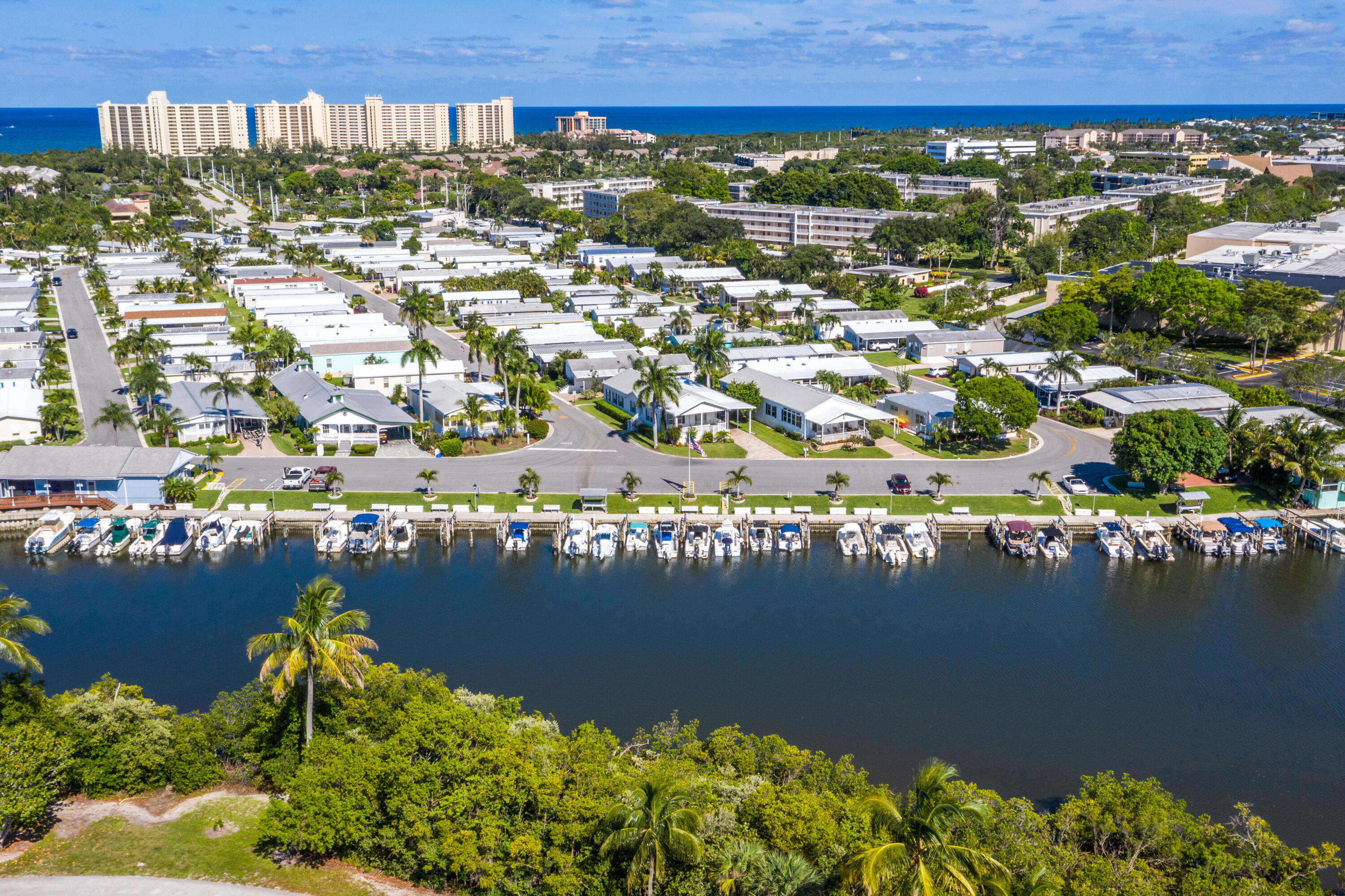 400 North Hwy A1A, Unit 47 Jupiter, FL 33477 - Photo 2 of 35 an aerial view of a house with a lake view